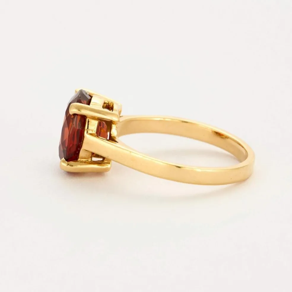 Bague en or jaune et grenat spessartite