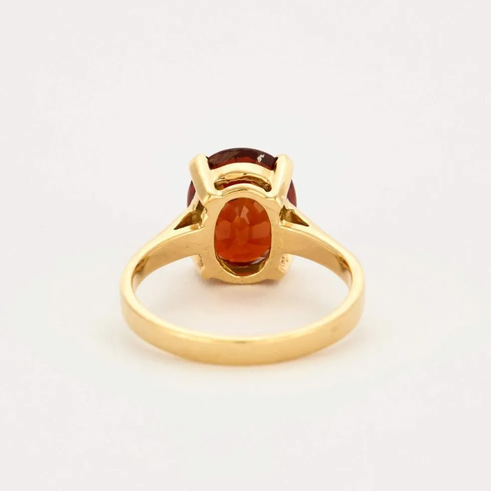 Bague en or jaune et grenat spessartite
