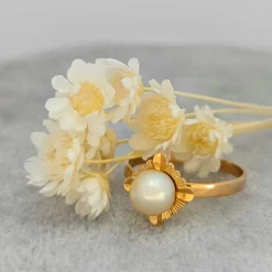 Bague en or jaune et perle