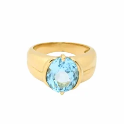 Bague en or jaune et topaze