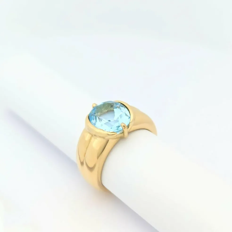 Bague en or jaune et topaze