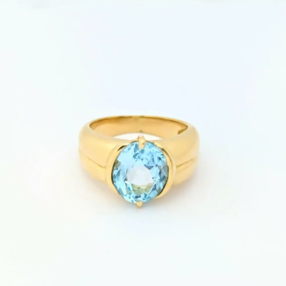 Bague en or jaune et topaze