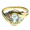 Bague en or jaune, gris, et aigue-marine