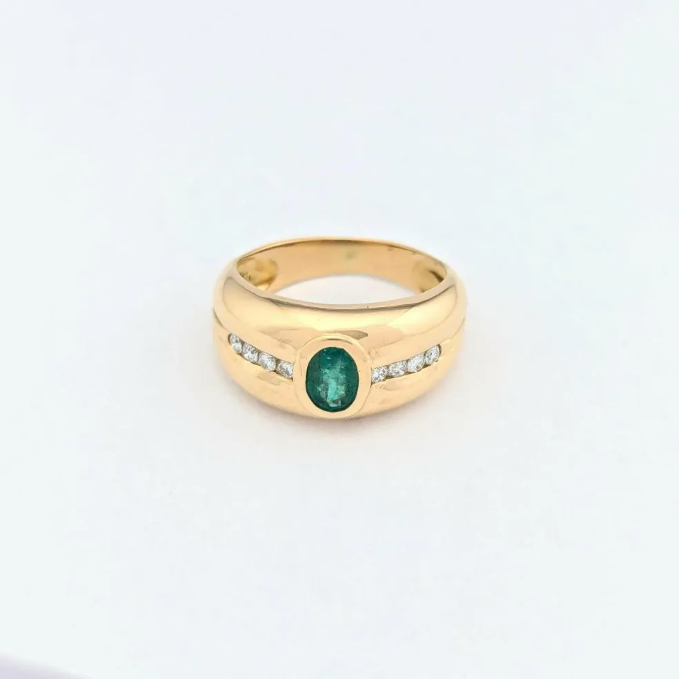 Bague en or jaune émeraude et diamants
