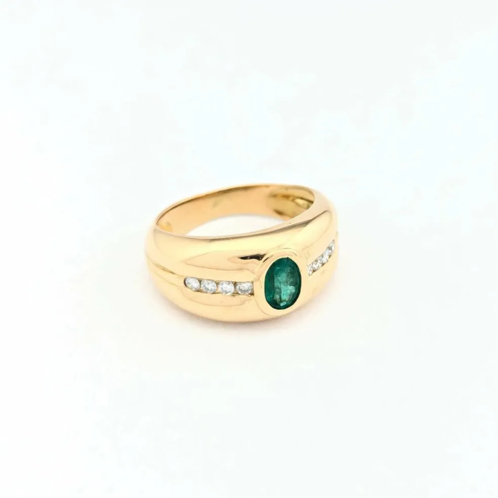 Bague en or jaune émeraude et diamants