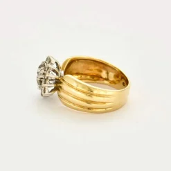 Bague en or jaune, or gris et diamants