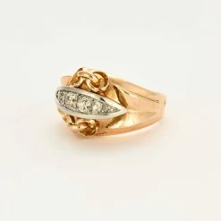 Bague en or jaune, or gris et diamants