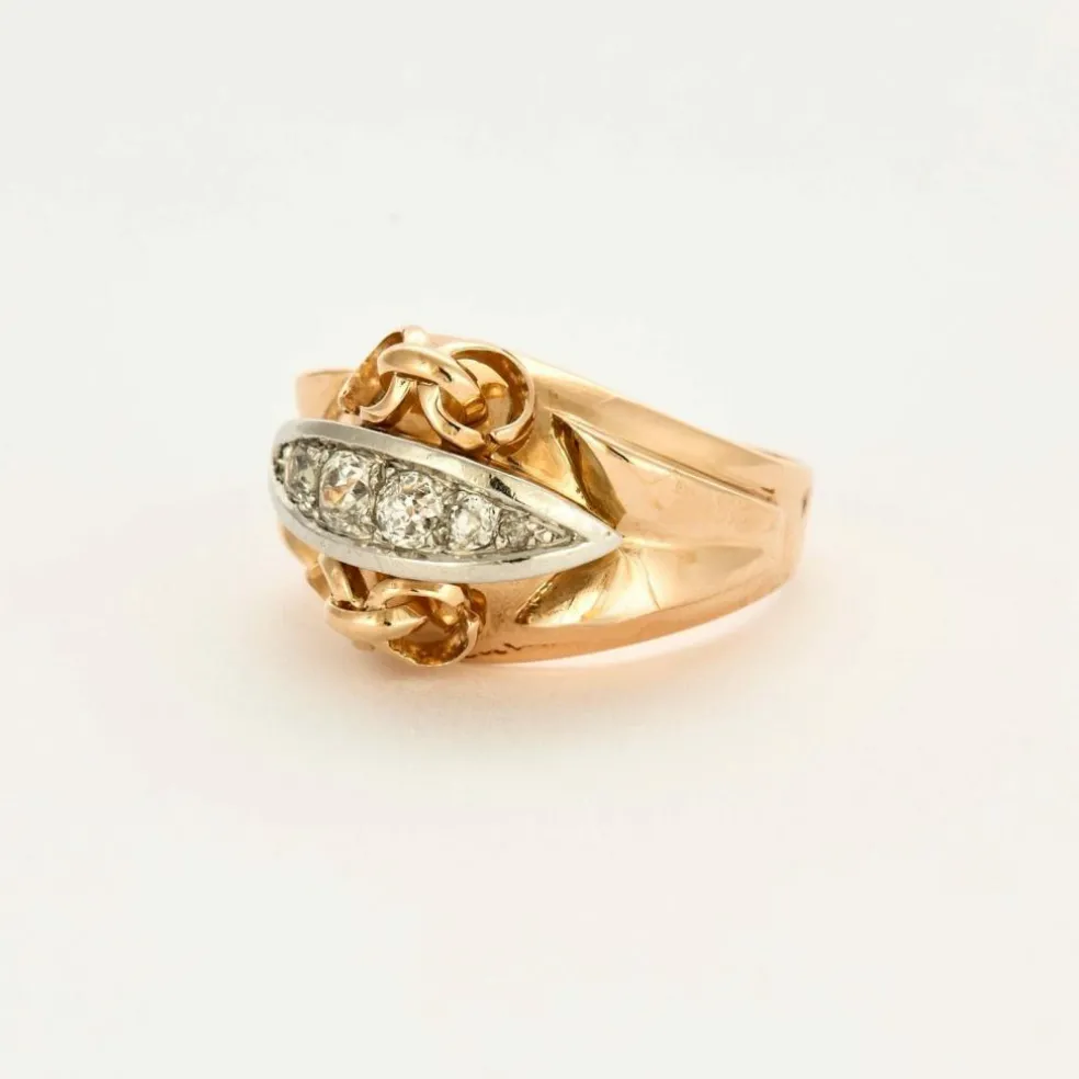 Bague en or jaune, or gris et diamants
