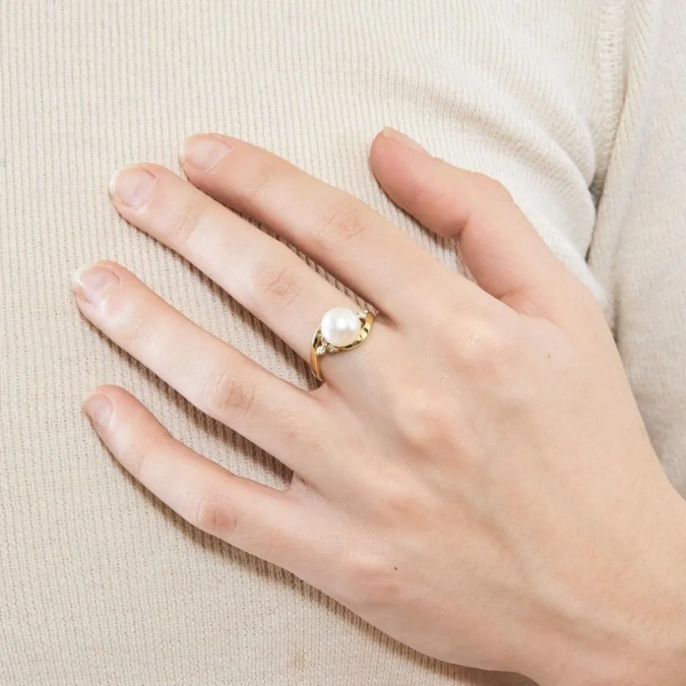 Bague en or jaune, perle de culture et diamants