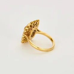 Bague en or jaune, rubis calibrés et diamants