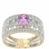 Bague en or jaune sertie de diamants et d'une pierre précieuse