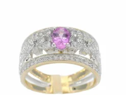 Bague en or jaune sertie de diamants et d'une pierre précieuse