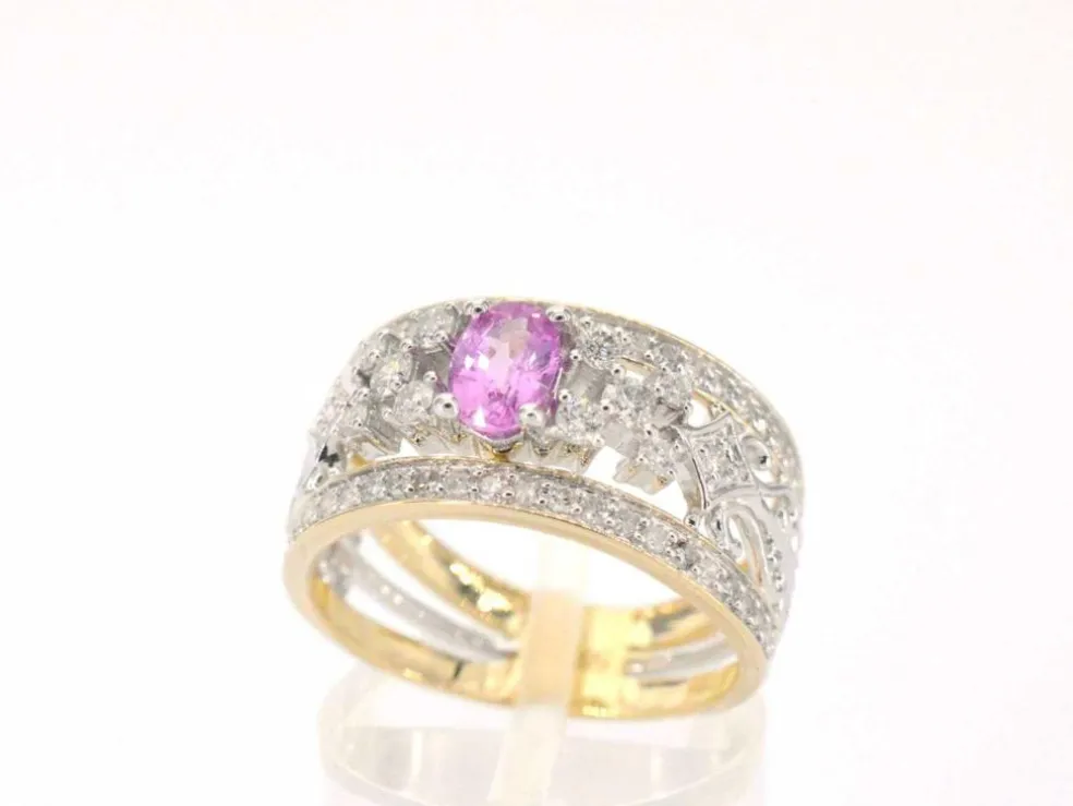 Bague en or jaune sertie de diamants et d'une pierre précieuse