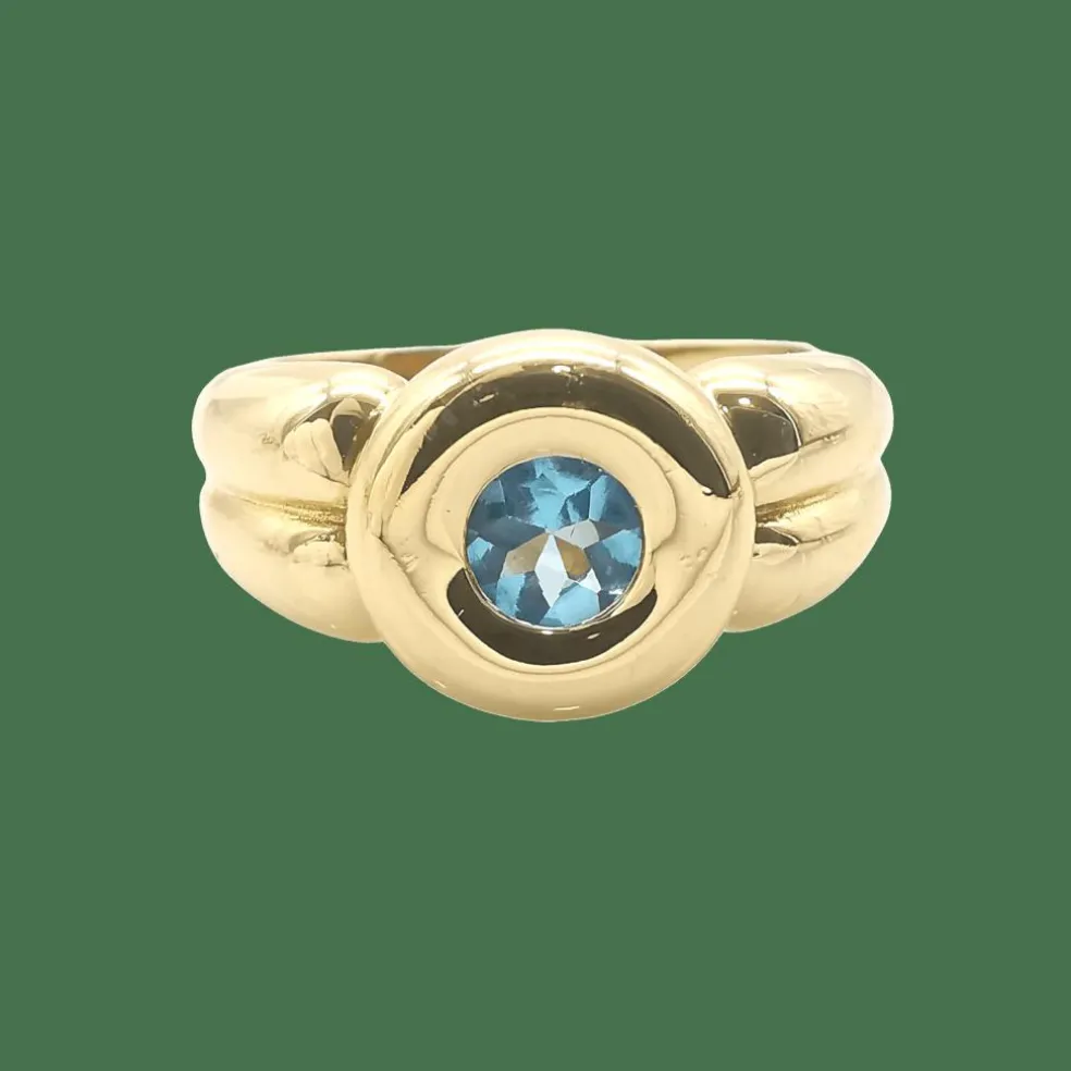 Bague en or jaune topaze