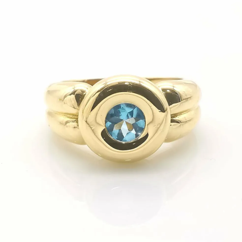 Bague en or jaune topaze