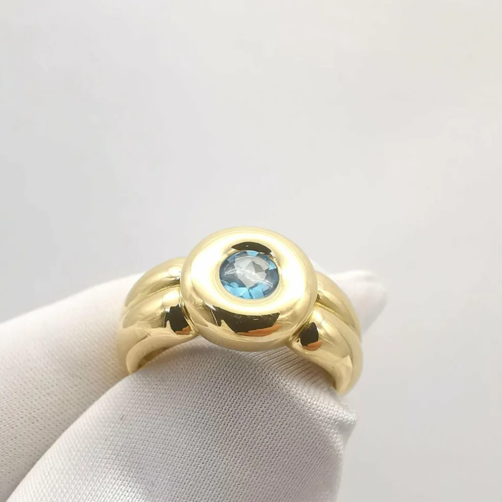 Bague en or jaune topaze