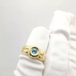 Bague en or jaune topaze