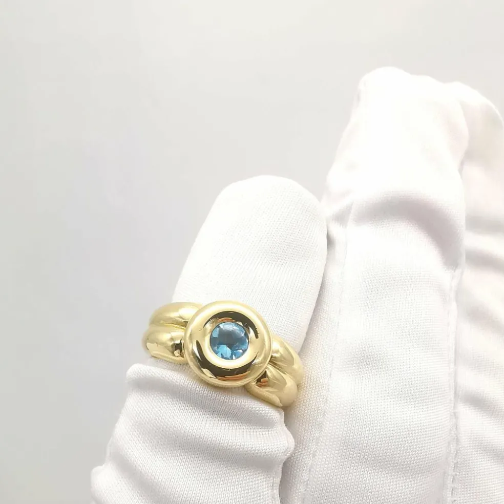 Bague en or jaune topaze