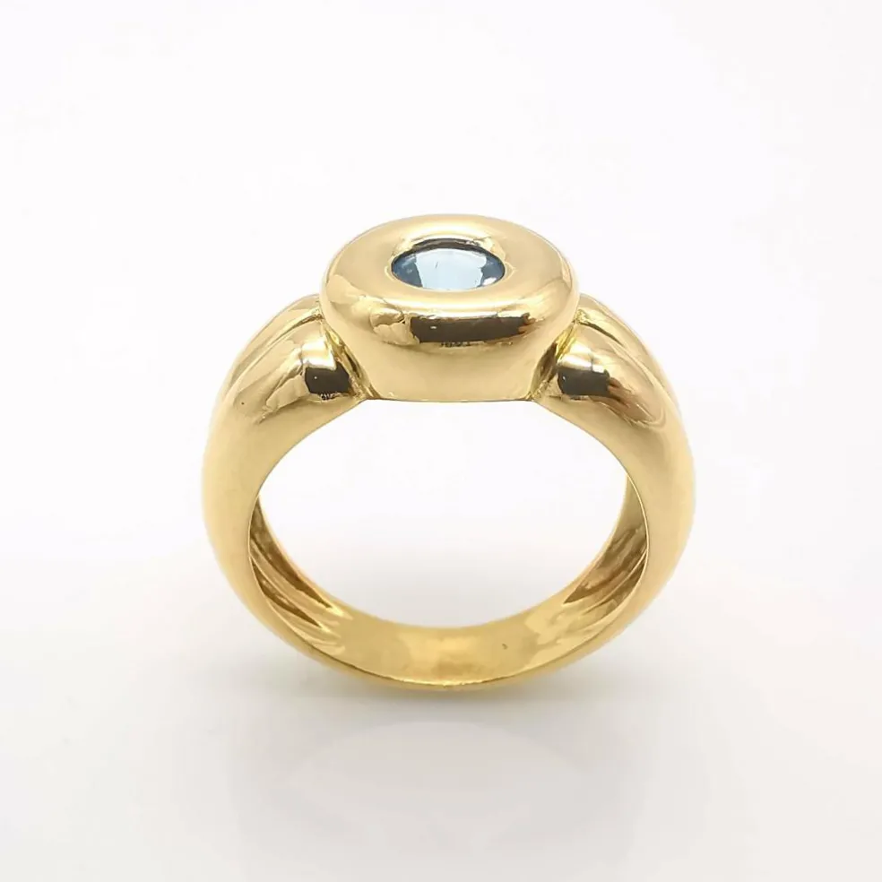 Bague en or jaune topaze