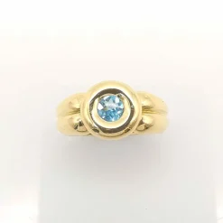 Bague en or jaune topaze