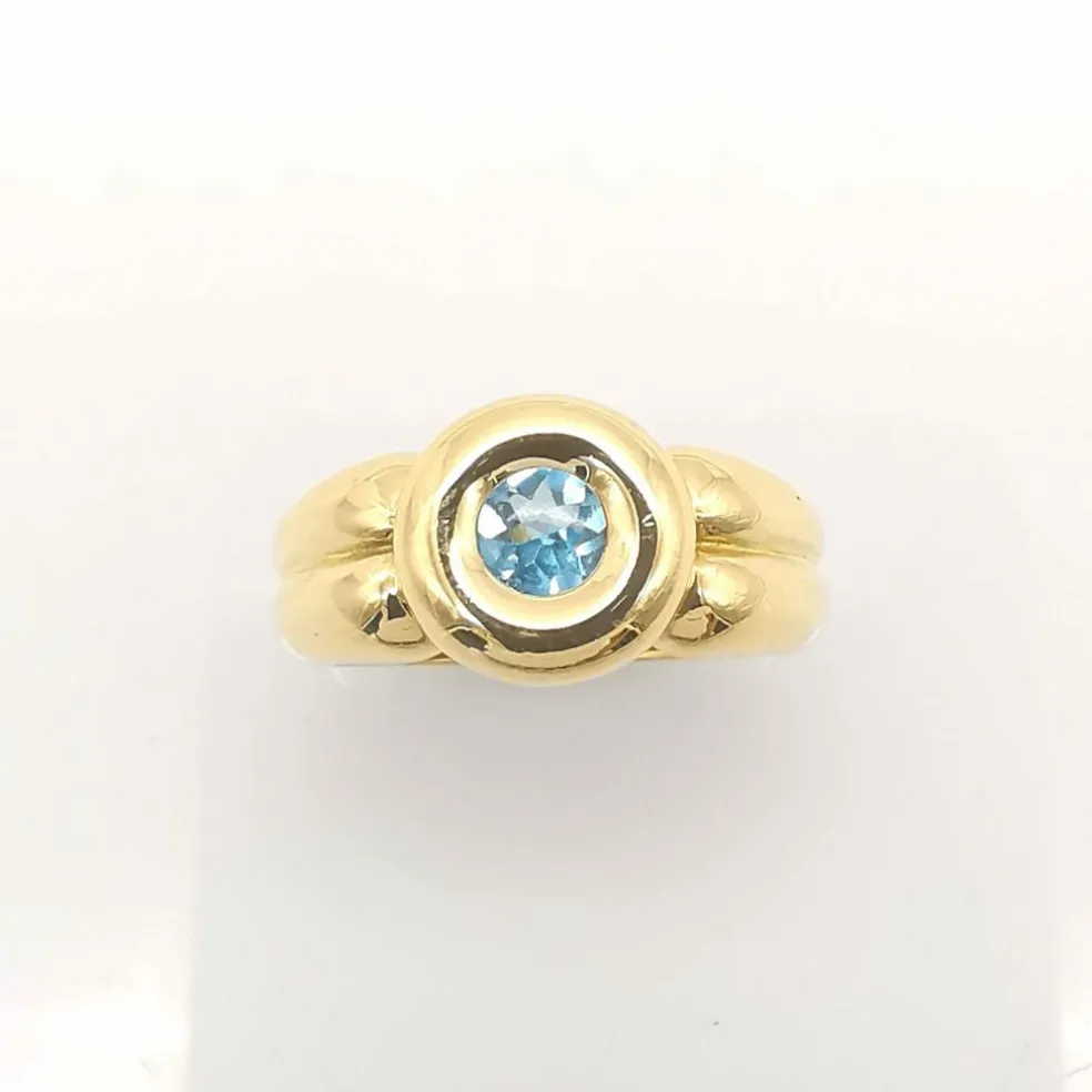 Bague en or jaune topaze