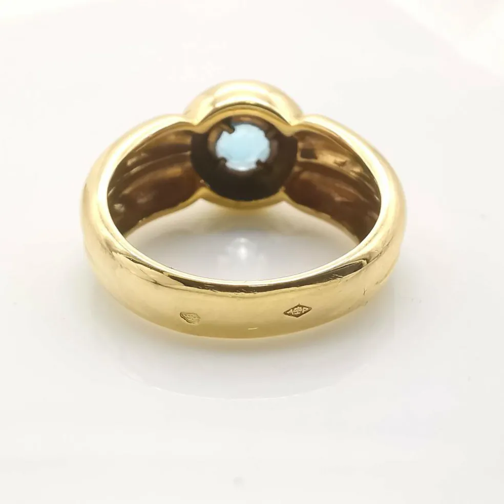 Bague en or jaune topaze