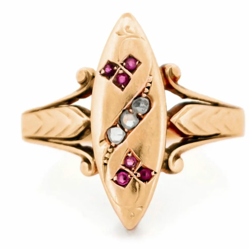 Bague en or rose 14 carats avec diamants et rubis