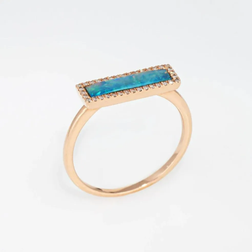 Bague en or rose 14 carats avec opale et diamant East West