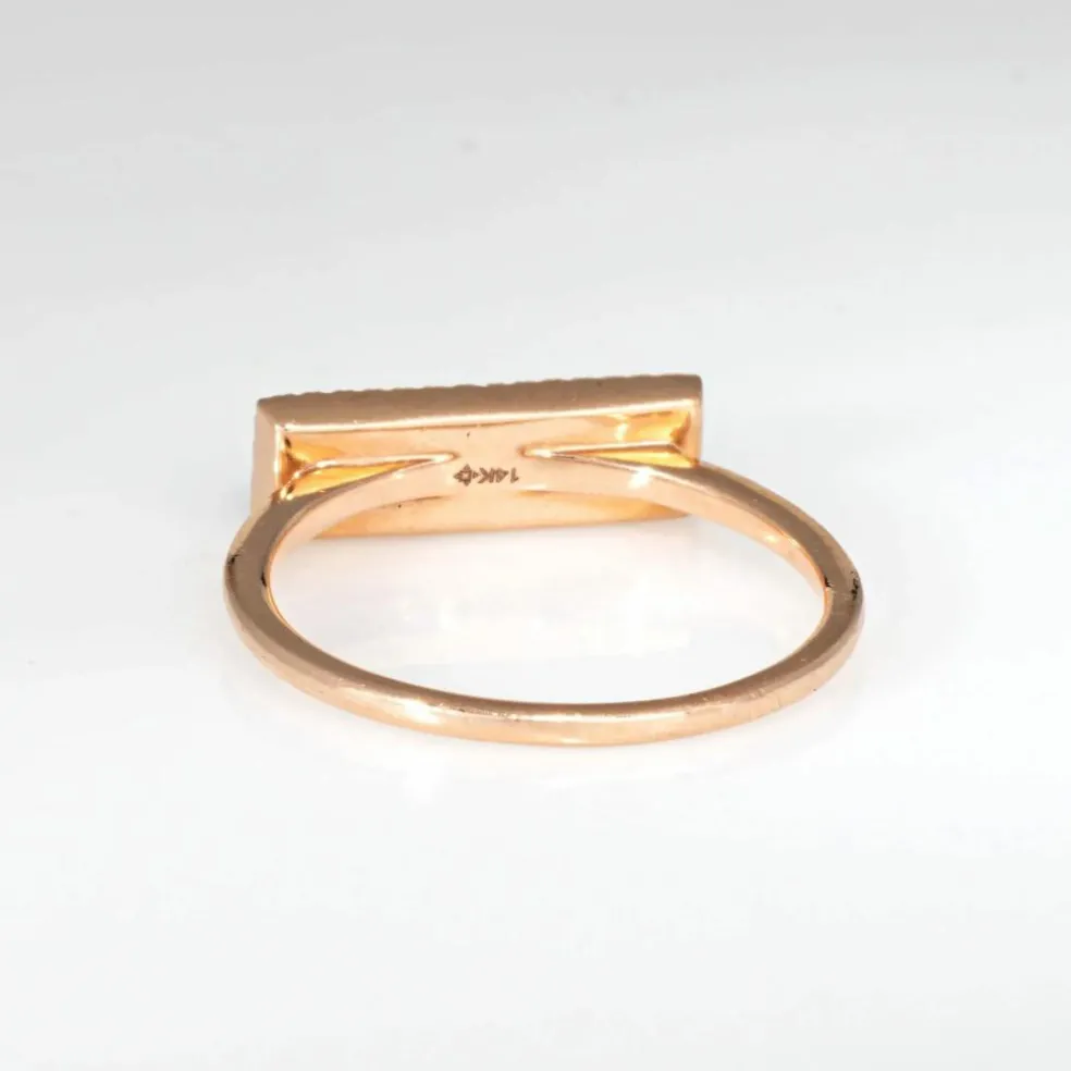Bague en or rose 14 carats avec opale et diamant East West