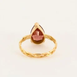 Bague en or rose et grenat