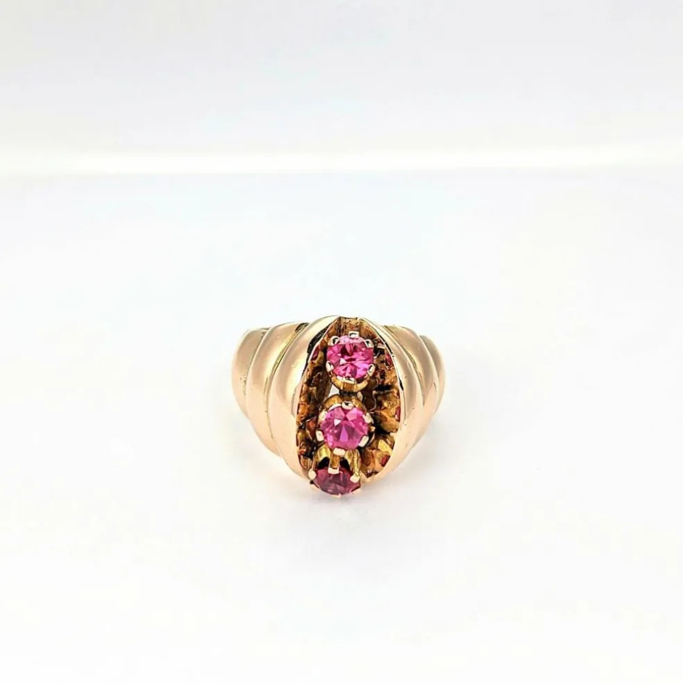 Bague en or rose et pierres roses