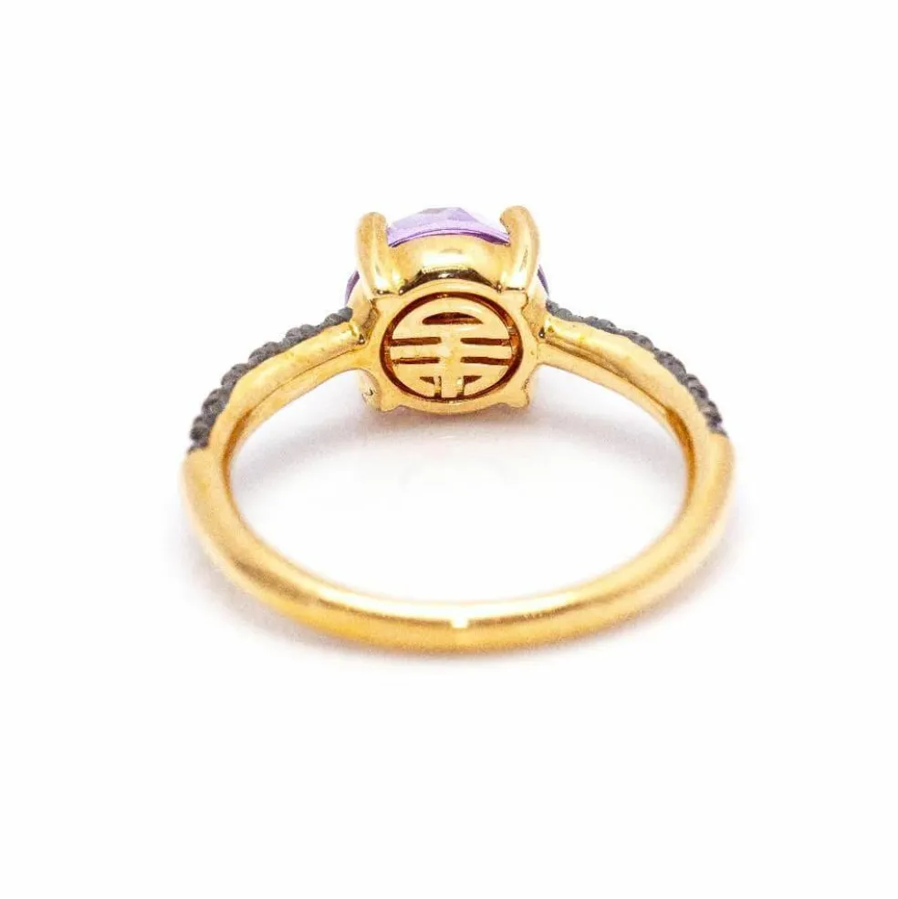 Bague en or rose, saphirs et améthyste