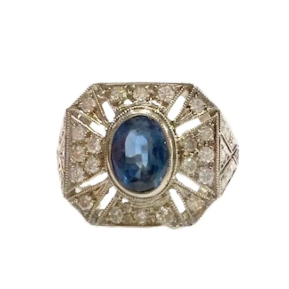 Bague en platine au design Art Déco avec diamants et saphirs