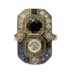 Bague en platine au design Art Déco avec diamants et saphirs