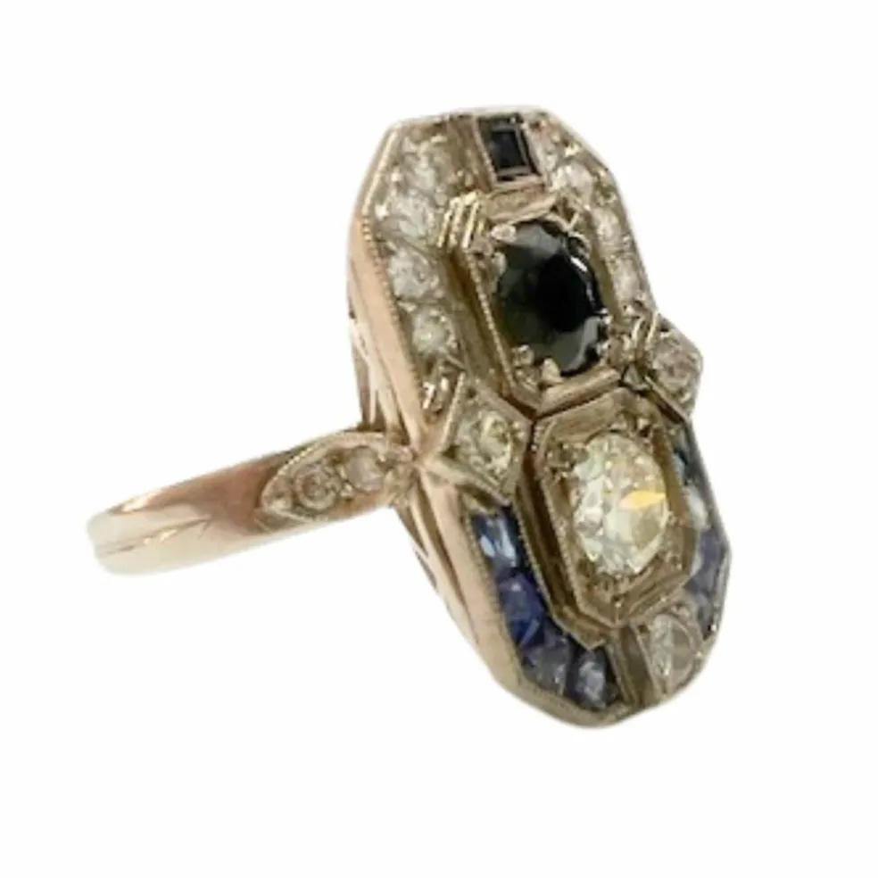 Bague en platine au design Art Déco avec diamants et saphirs