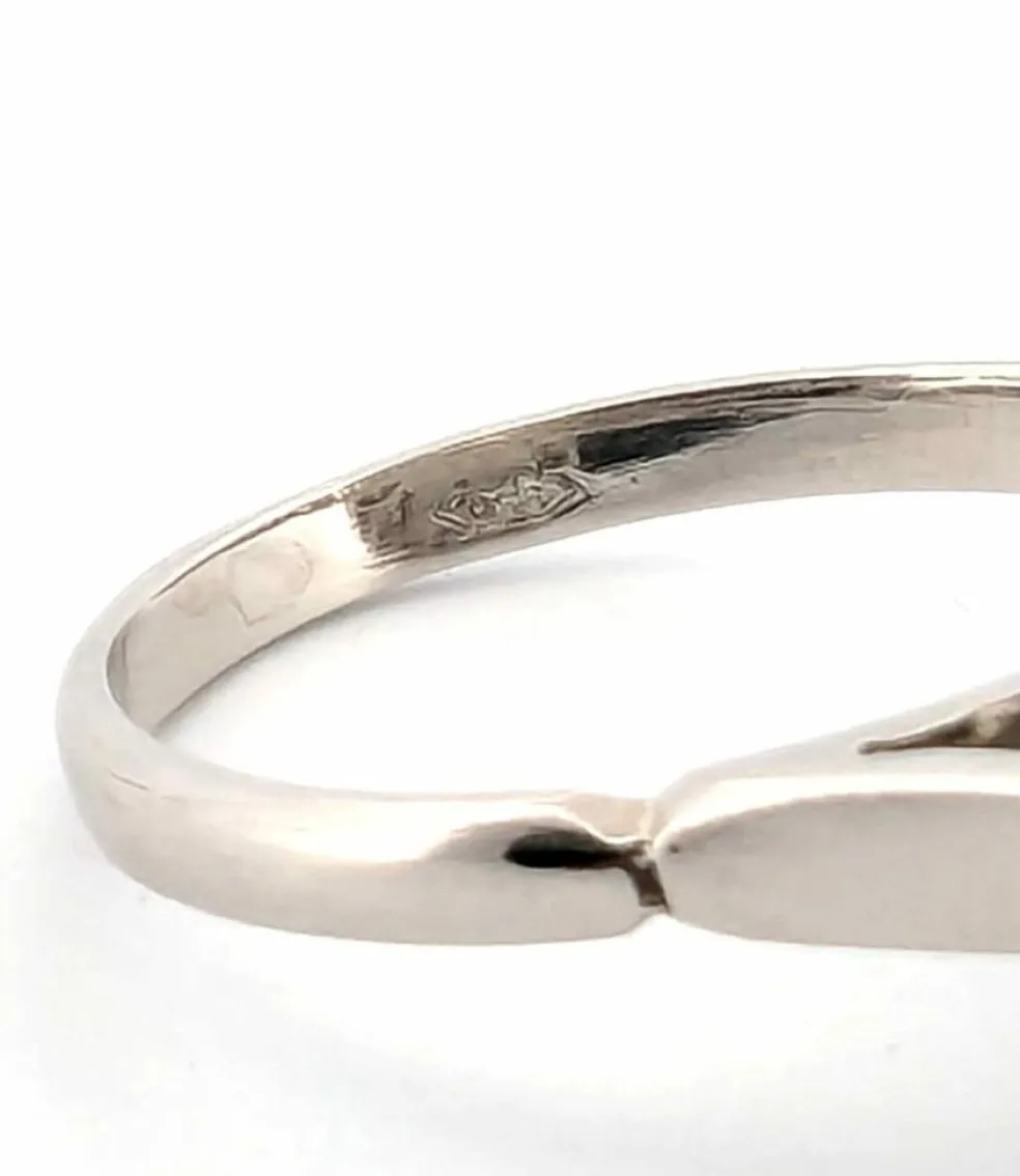 Bague en platine avec aigue-marine centrale et diamants environnants
