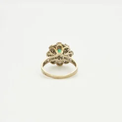 Bague en platine et or gris diamants et émeraude