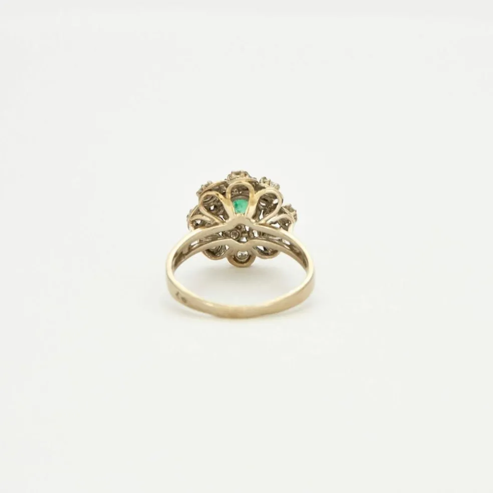 Bague en platine et or gris diamants et émeraude