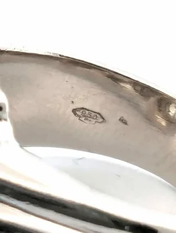 Bague en platine massif avec diamants centraux et diamants latéraux