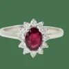 Bague entourage en or blanc, rubis et diamants