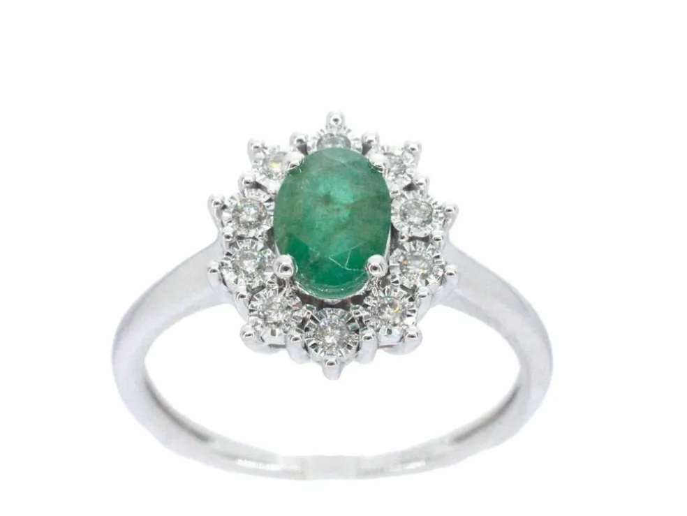Bague entourage en or blanc avec émeraude et diamants