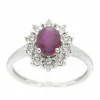Bague entourage en or blanc avec rubis et diamants