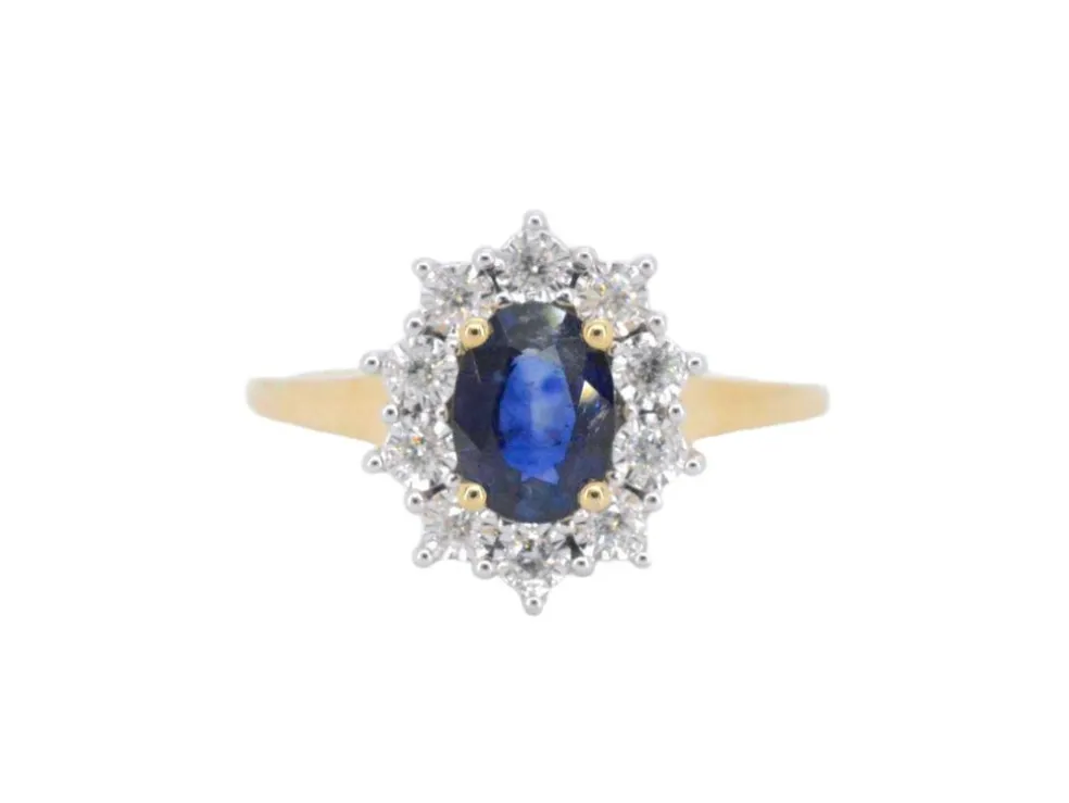 Bague entourage en or jaune avec saphir et diamants