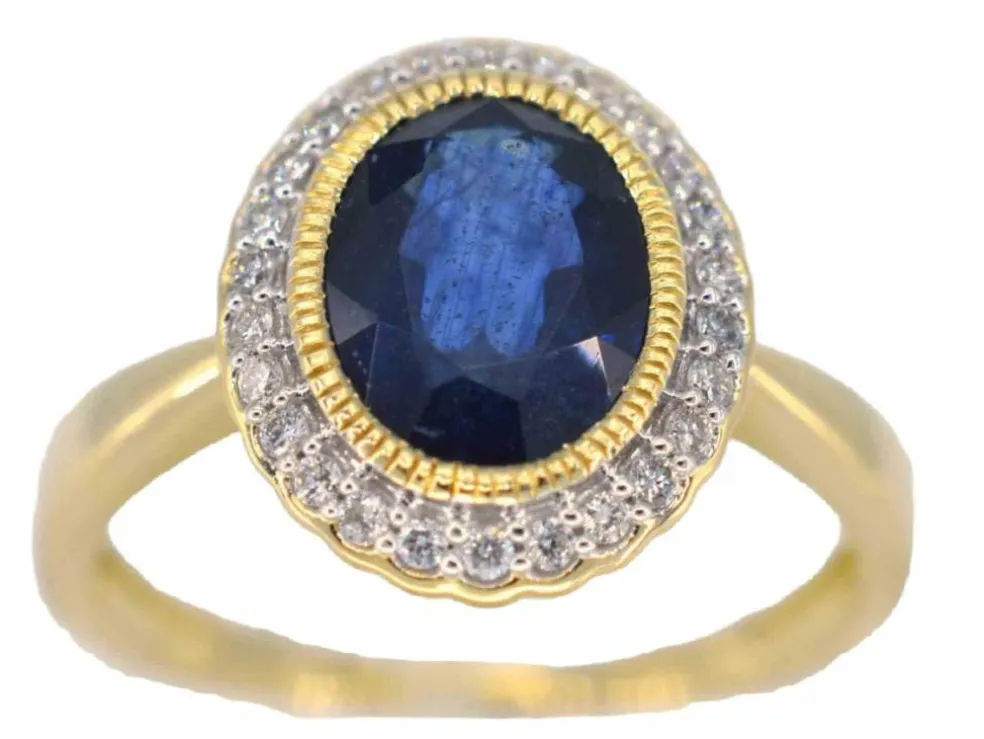 Bague entourage en or jaune avec diamants et saphir