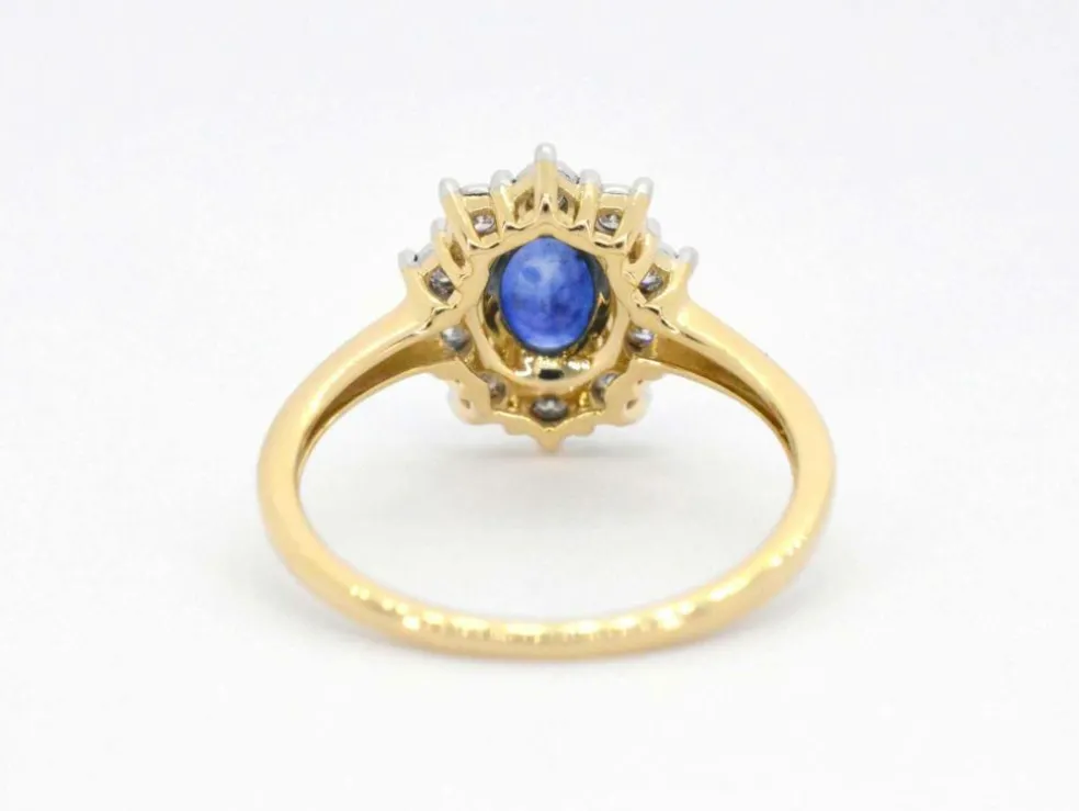 Bague entourage en or jaune avec saphir et diamants