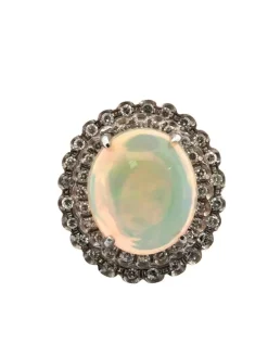Bague exceptionnelle en or jaune avec opale Harlequin et diamants
