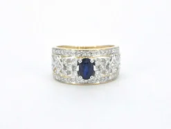 Bague exclusive en or sertie de diamants et d'un saphir
