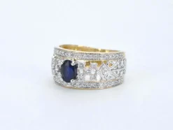 Bague exclusive en or sertie de diamants et d'un saphir