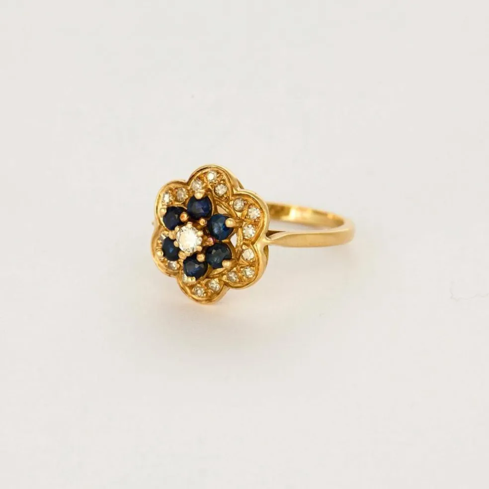 Bague fleur en or jaune, saphir et diamants