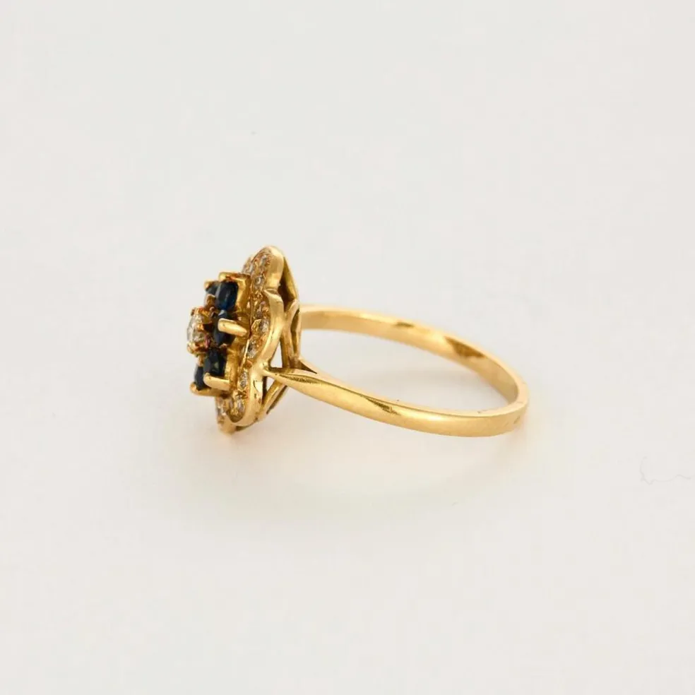 Bague fleur en or jaune, saphir et diamants